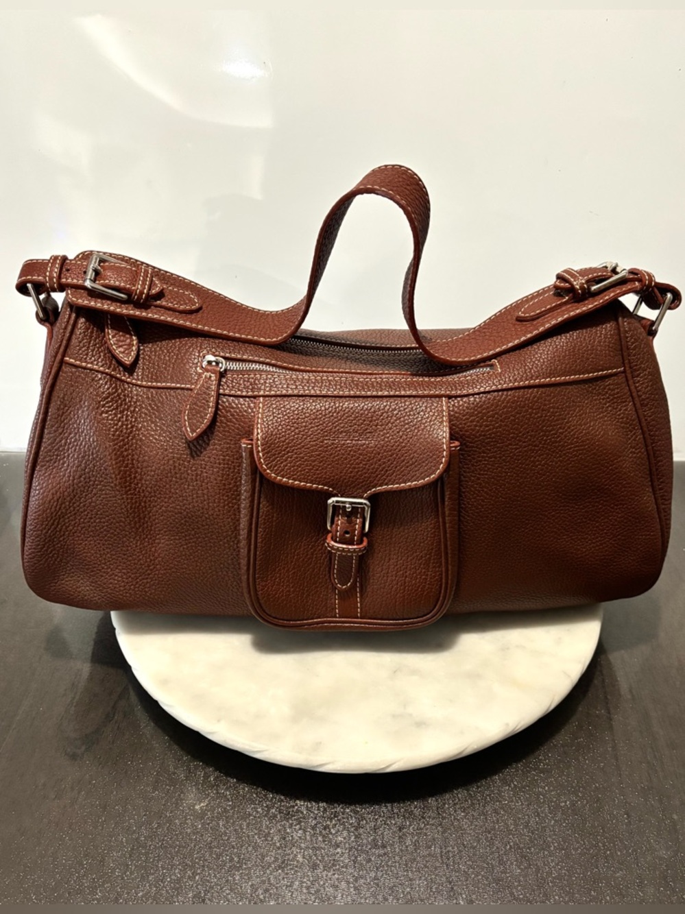Dooney & Bourke Alto Collection Pebbled Brown Italian Leather Buckle Duffle Bag